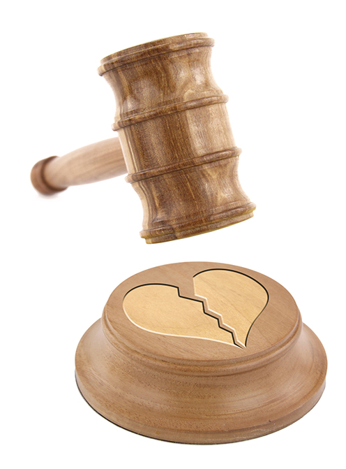 A judge’s gavel coming down on a broken heart design